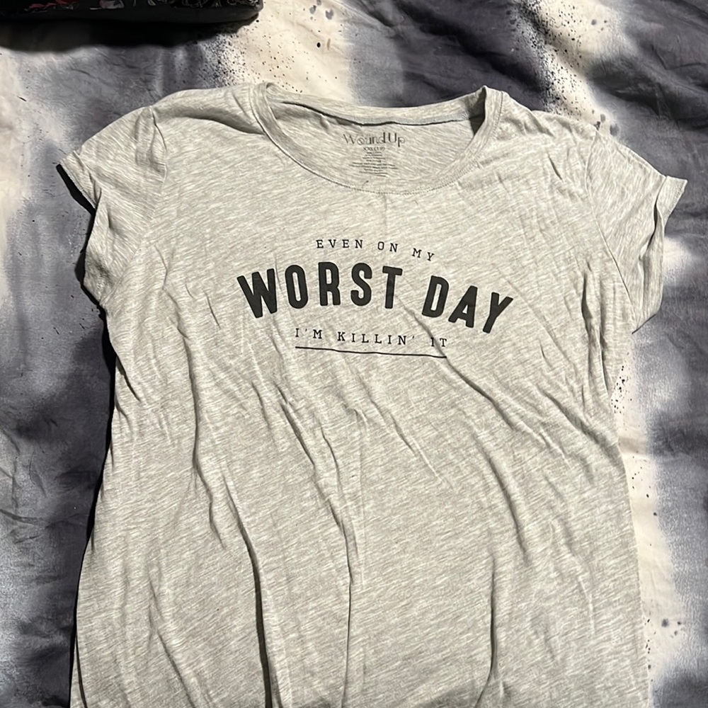 T-shirt. Fits like a medium